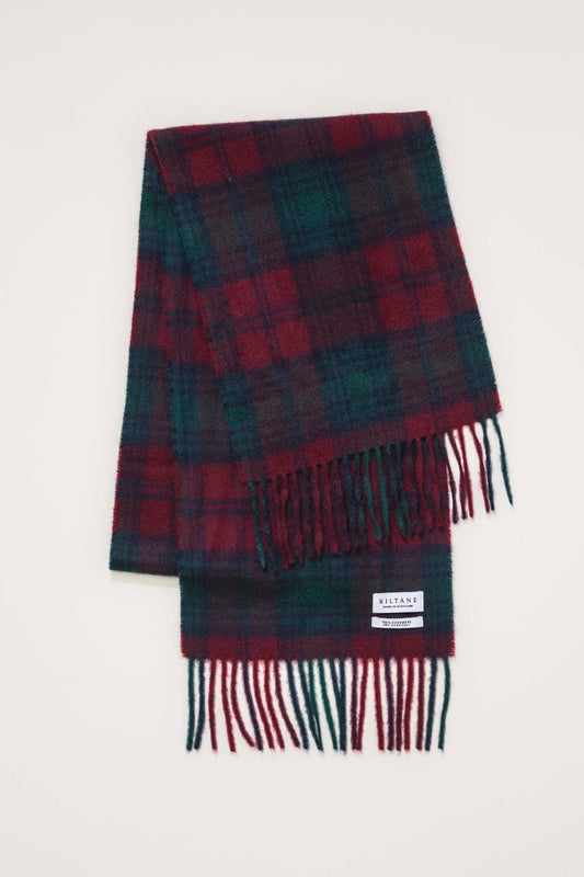 Kiltane Made in Scotland Heritage Cashmere Scarf in Lindsay tartan, folded to show red and green plaid pattern with fringed ends