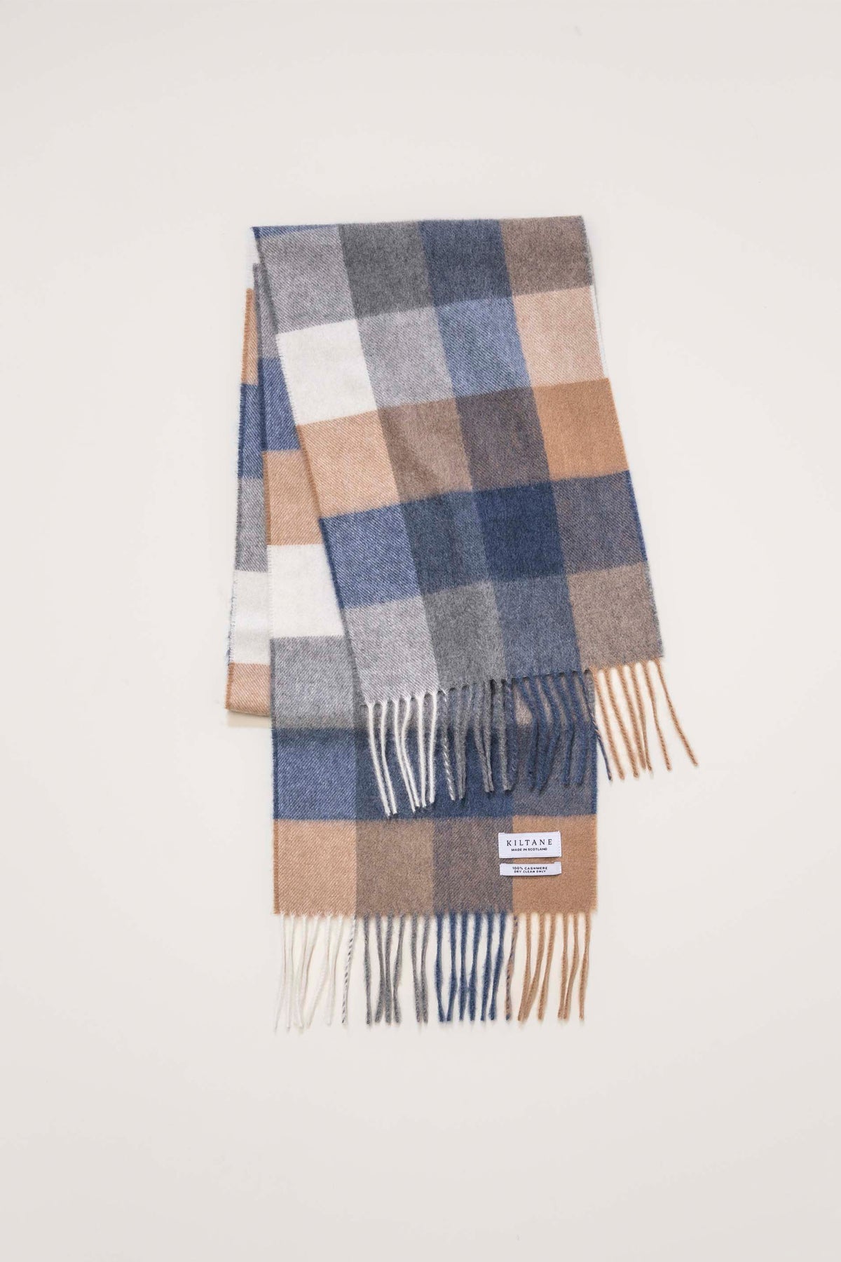 Kiltane Made In Scotland 5 Square Cashmere Scarf in Sandwood Armada folded flat showing check pattern and fringed ends