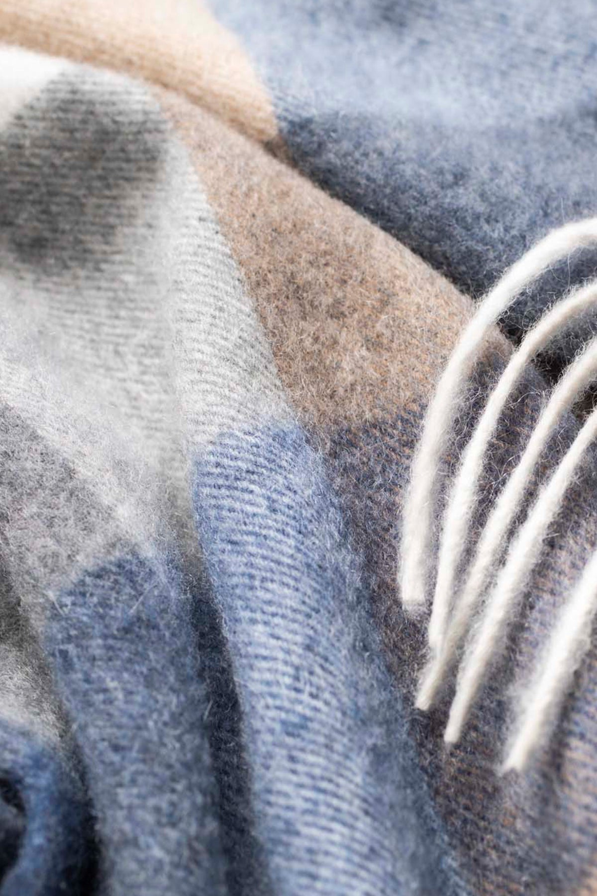 Close-up of Made In Scotland 5 Square Cashmere Scarf in Sandwood Armada showing soft twill weave and white fringe detail
