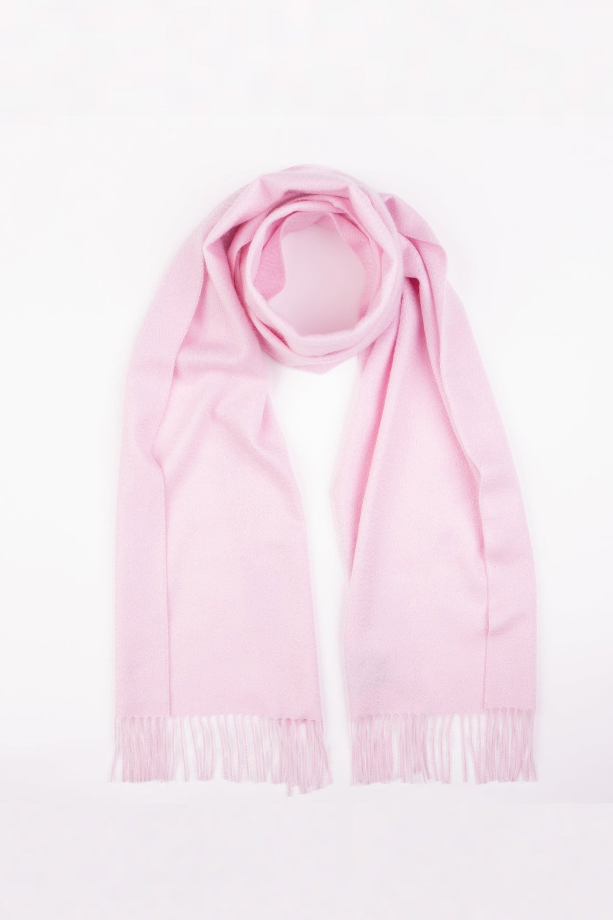 Solid Lambswool Scarf in Pale Lilac loosely looped at the top with fringed ends draped flat on a white background