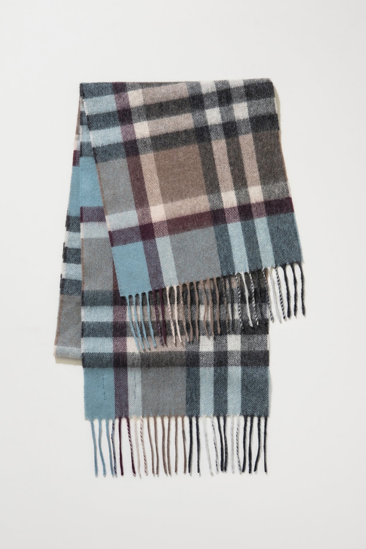 Tartan 2 Lambswool Scarf in Blue Taupe folded flat showing full plaid pattern with twisted fringe detail at both ends