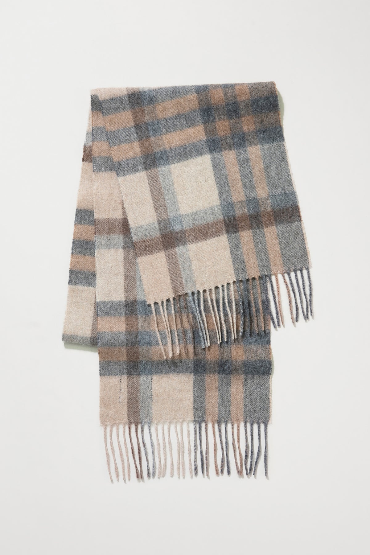 Tartan 2 Lambswool Scarf in Natural folded flat showing full plaid pattern in beige, grey, and brown with fringed ends