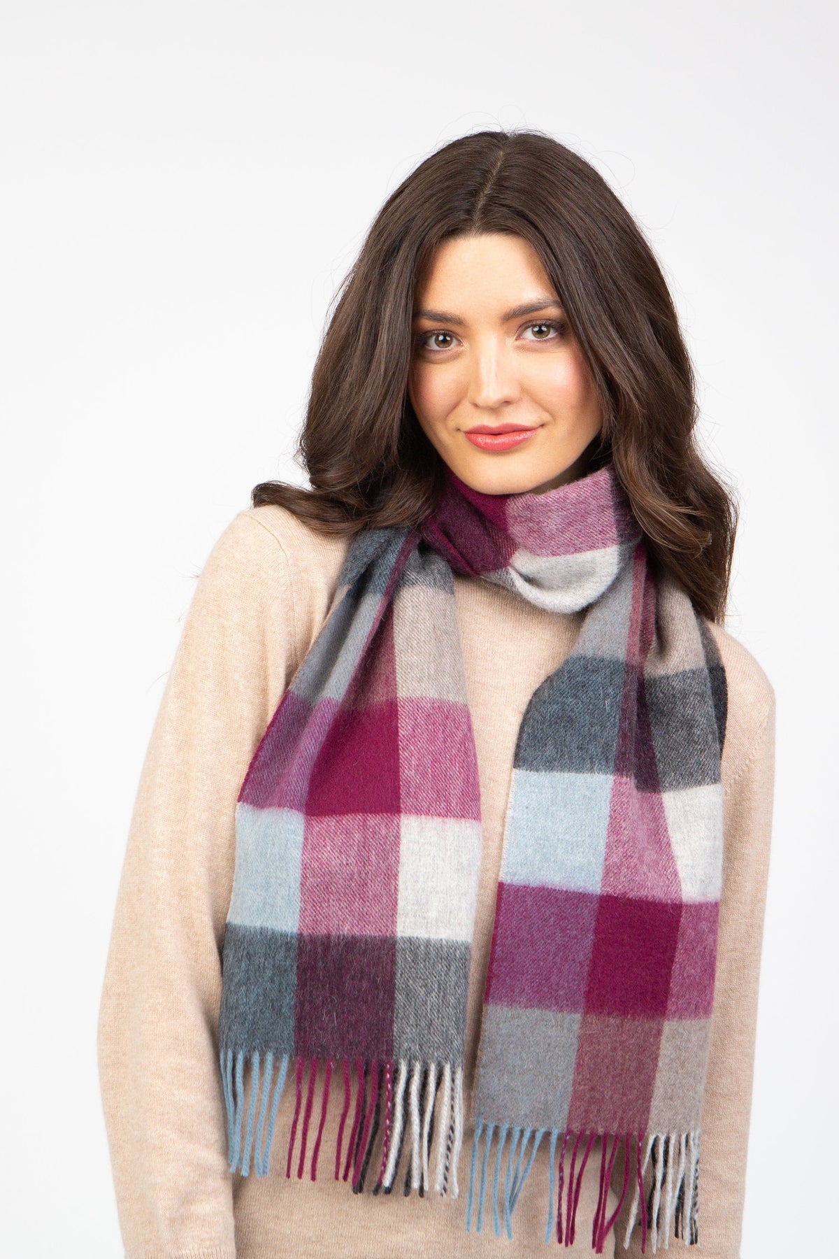 Checkers Lambswool Scarf in Burgundy with plaid pattern in burgundy, pink, grey, and light blue with fringed ends