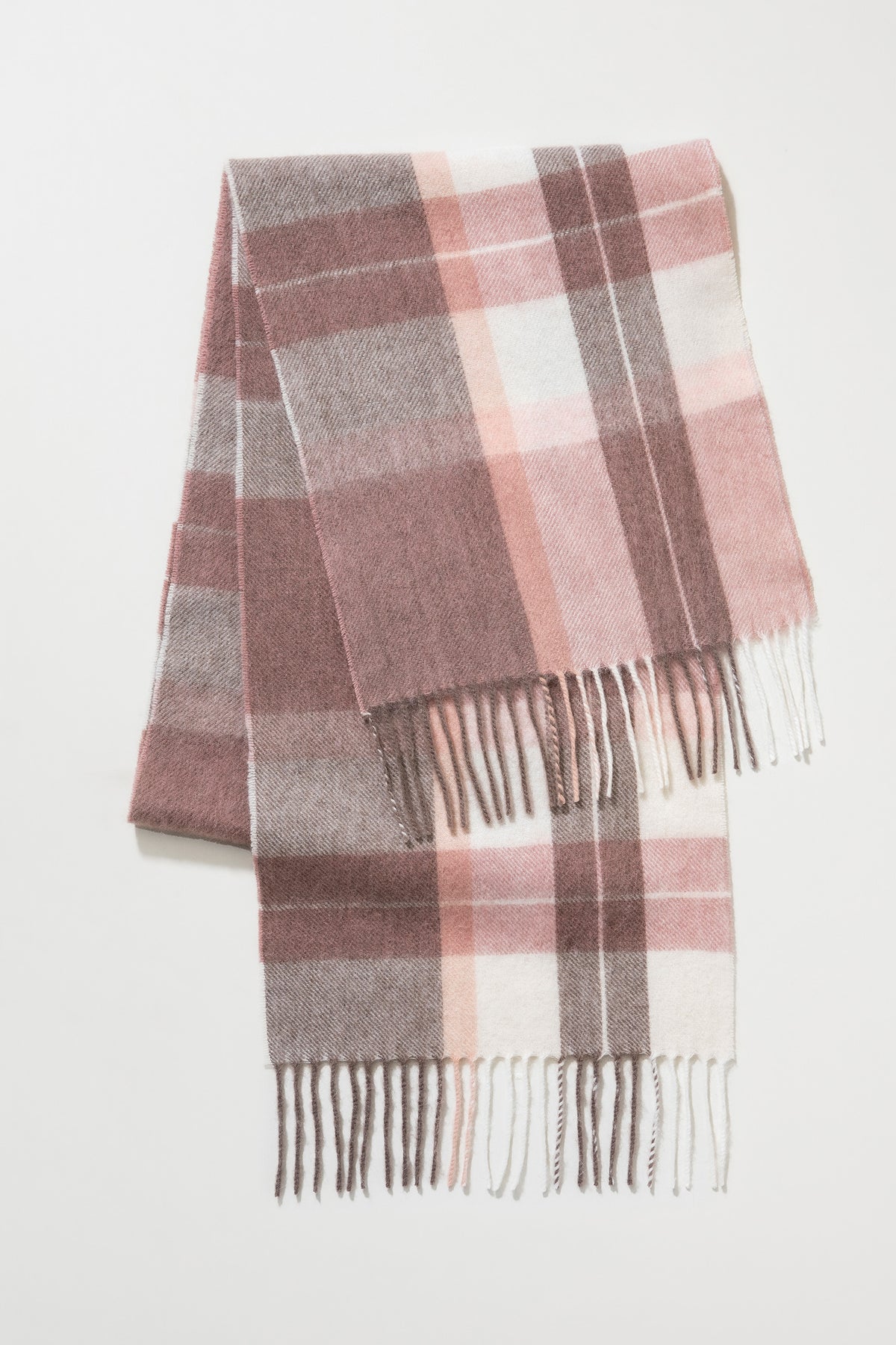 Contemporary Check Lambswool Scarf in Cameo folded flat showing pink, mauve, grey, and cream plaid pattern with fringed ends