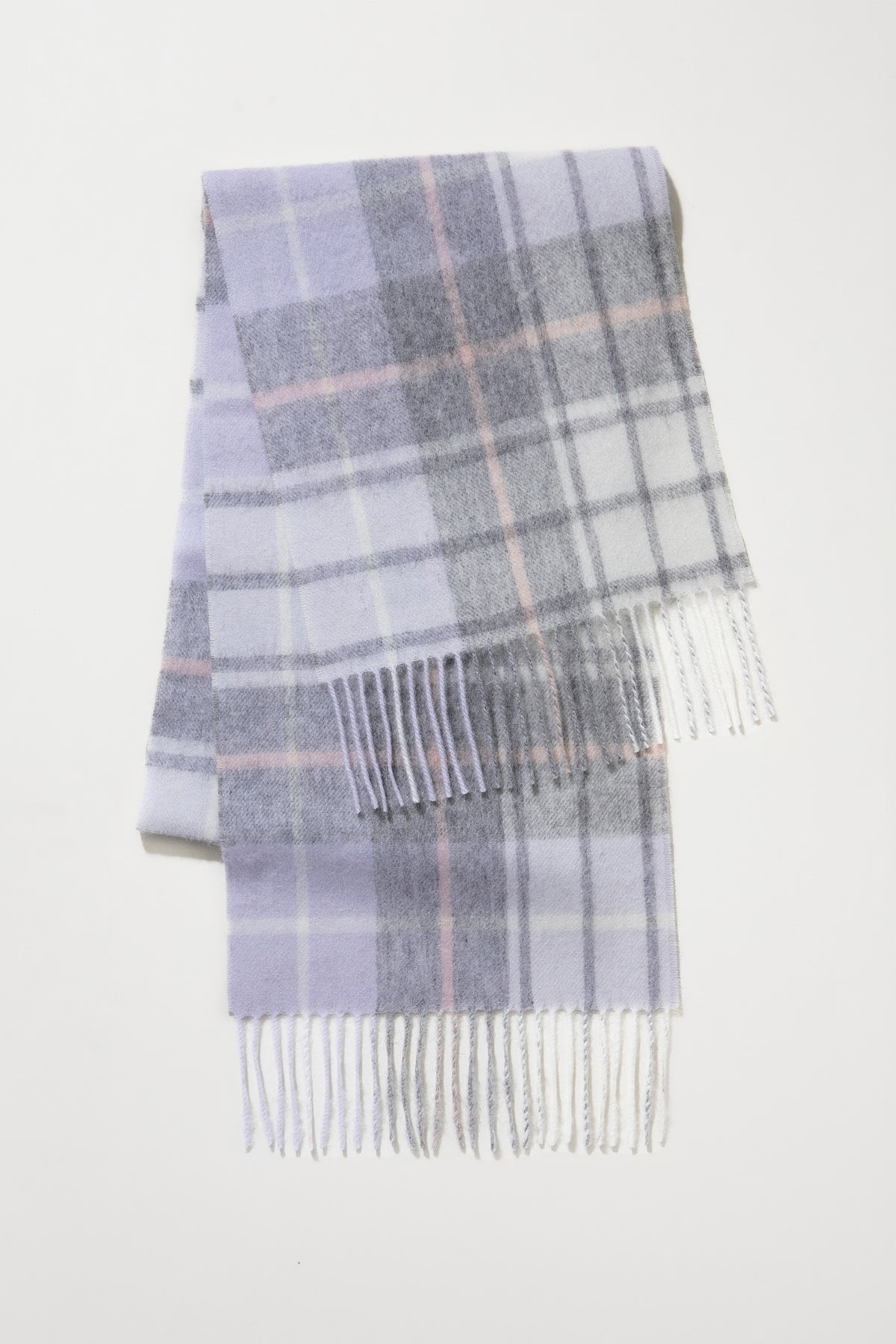 Contemporary Check Lambswool Scarf in Moonshadow folded flat showing lavender, grey, and pink plaid pattern with fringed ends