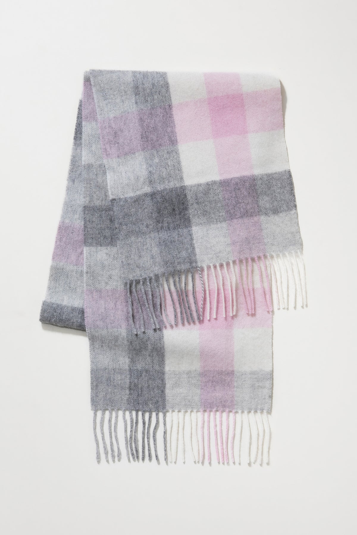 5 Square Check Lambswool Scarf in Cherub laid flat showing pink, grey, and white check pattern with fringed ends