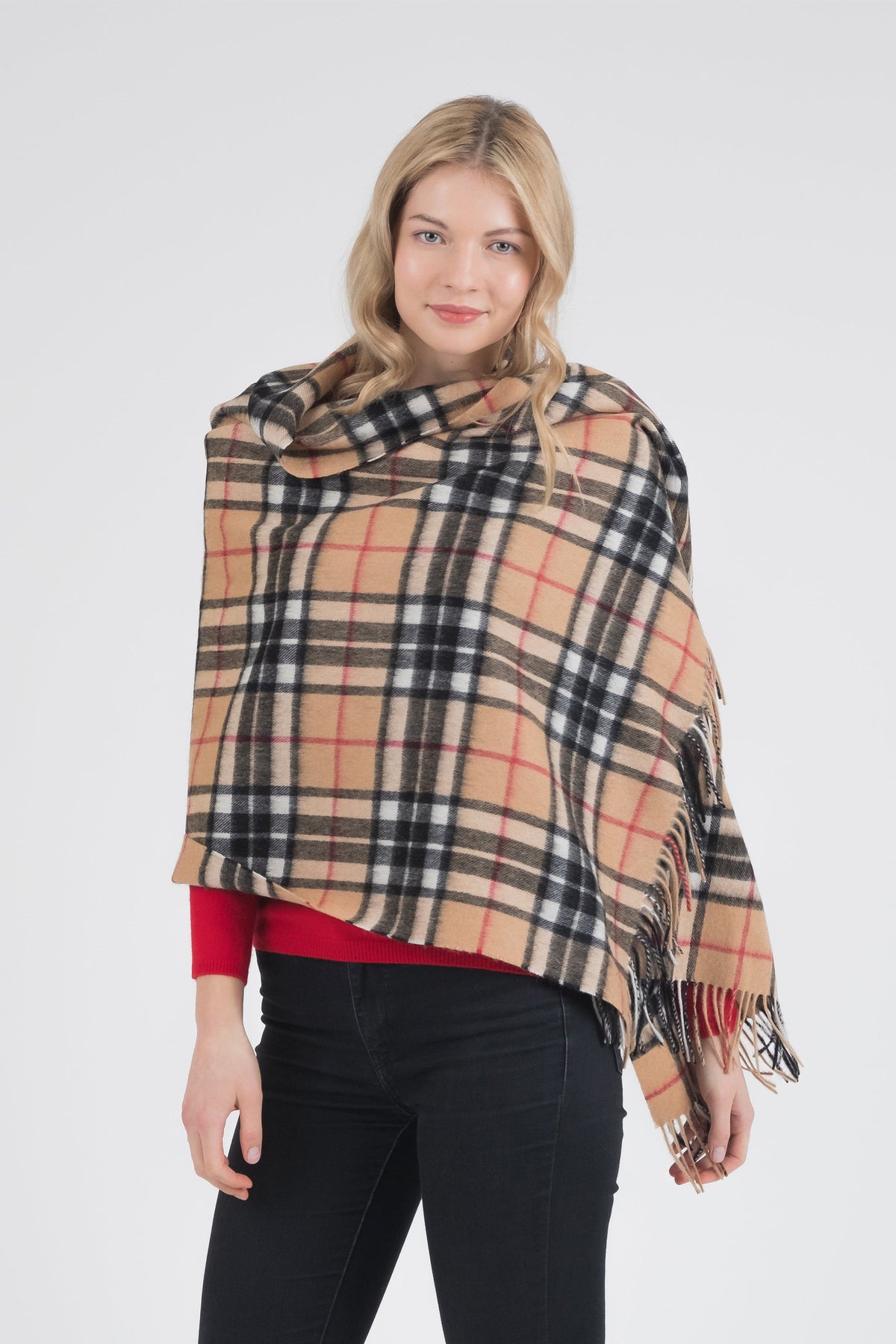 Scotty Thompson Lambswool Stole in Camel, classic tan plaid with black, white, and red lines, fringed edges, worn as a wrap