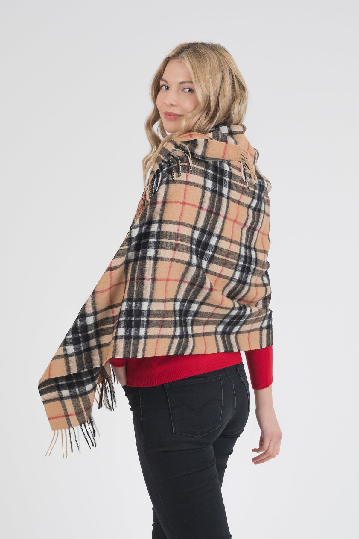 Back view of Scotty Thompson Lambswool Stole in Camel draped over shoulders, showing classic plaid pattern with fringed edges