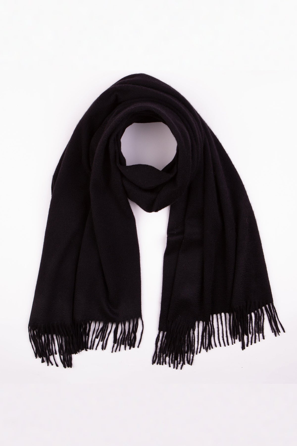 Solid Lambswool Stole in Black draped and looped flat-lay showing soft wool texture and fringed ends